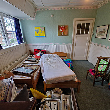Various wooden children&#39;s beds