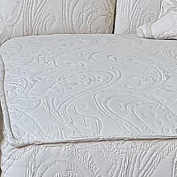 classic light beige 2-seater sofa with footstool
