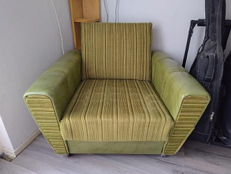 Groene stoel met vering